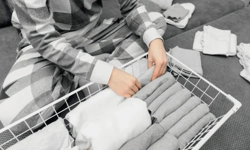 close-up-arranging-clothes